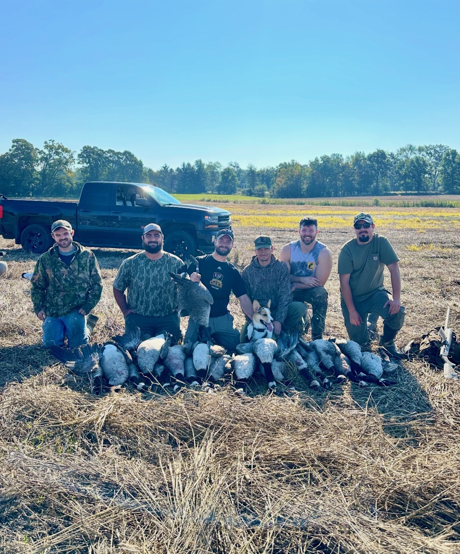 Group of hunters with Canada geese